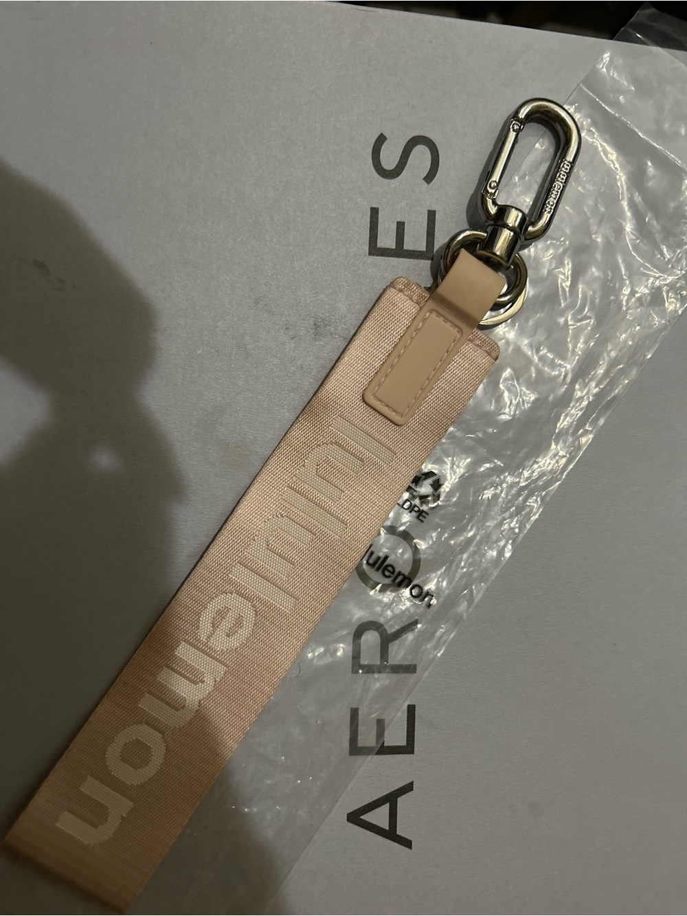 lululemon athletica pink keychain